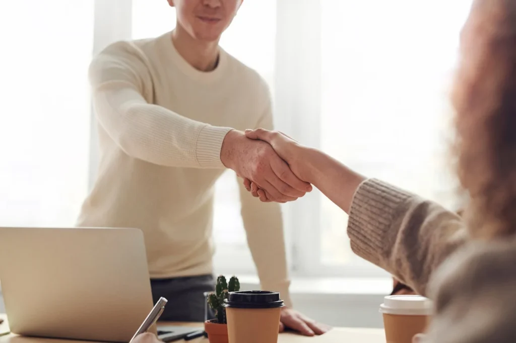 Handshake in a Airbnb management Perth meeting setting