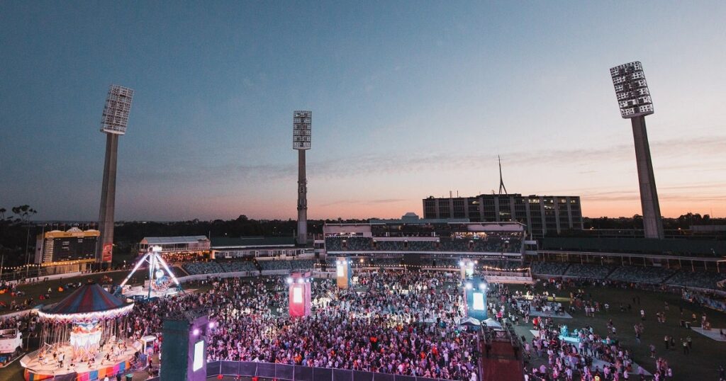 Crowd at outdoor Perth Seasons Series event.