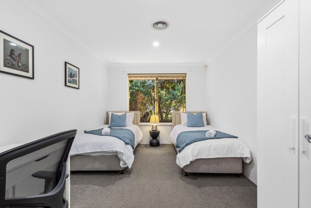 kits room with two single beds.