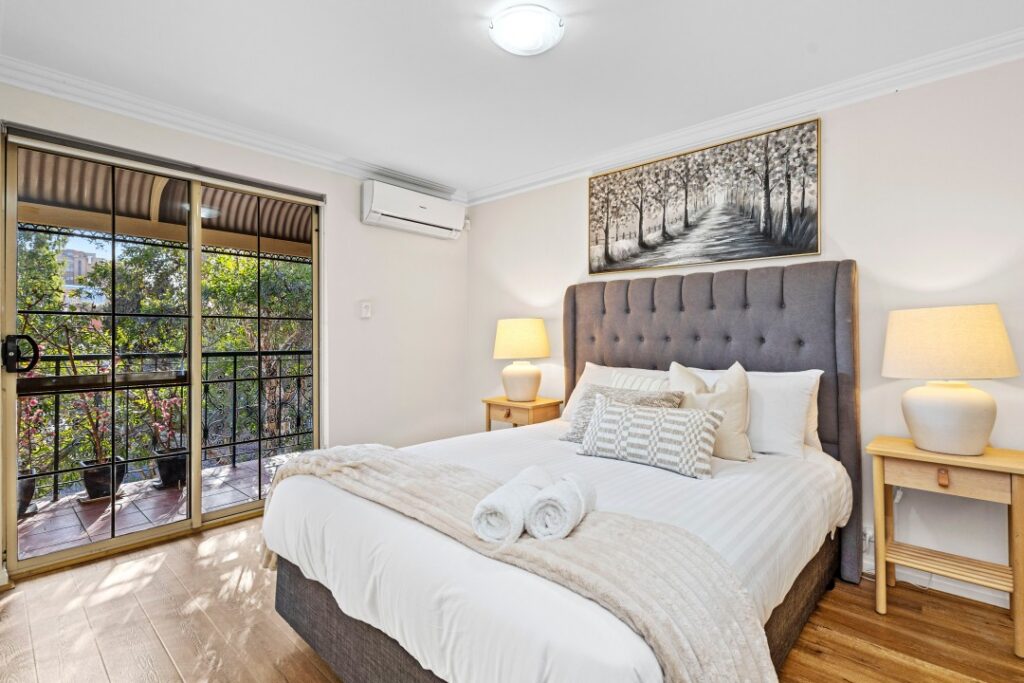 Cozy main bedroom with natural light in the Bishops Escape.