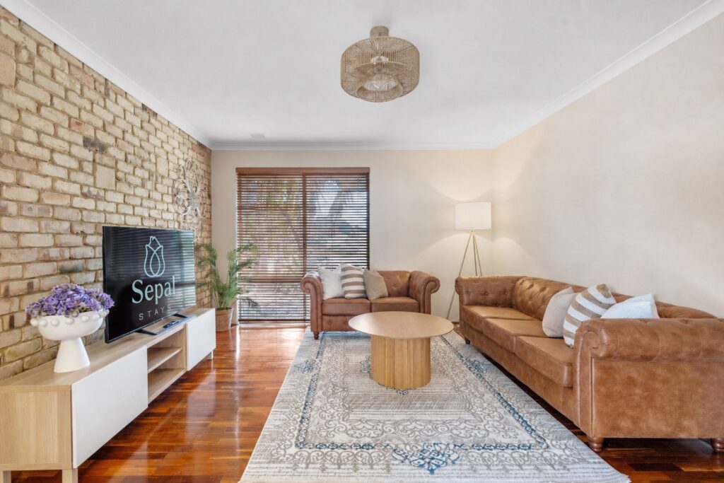 A living room with Airbnb property styling.
